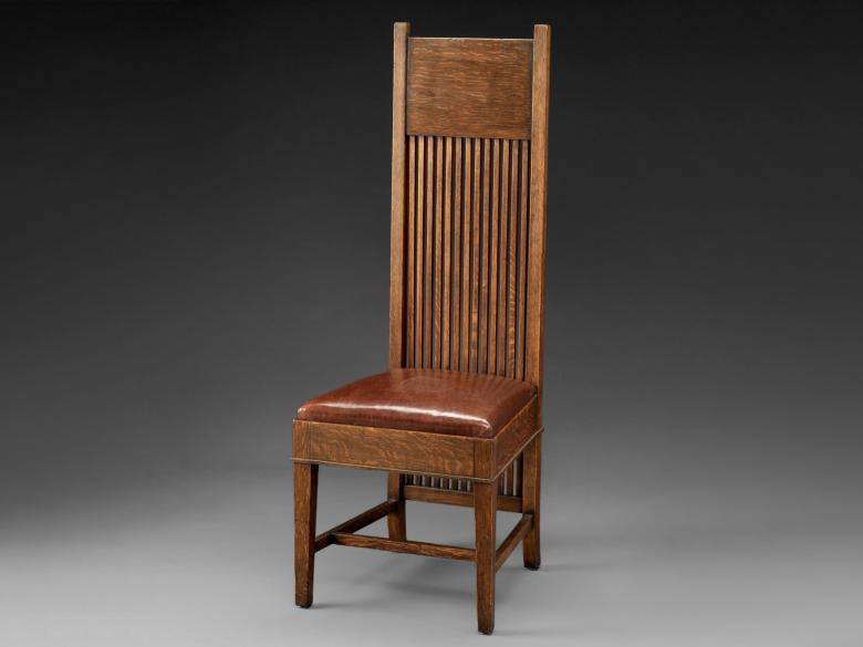 Tall back side chair designed by Frank Lloyd Wright