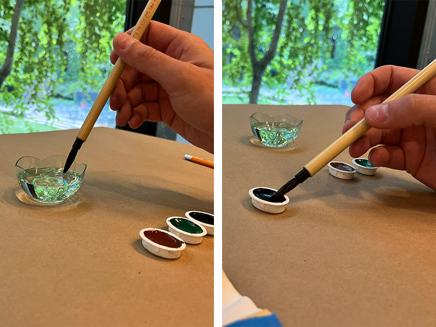 On left, dipping paintbrush into small bowl of water; on right, dabbing wet paintbrush head on watercolor paint