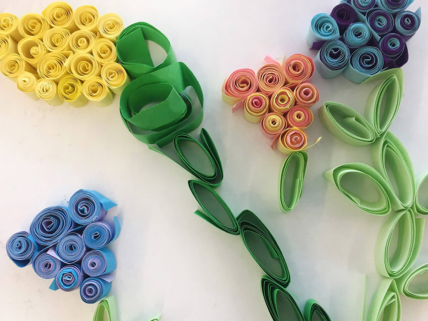 quilled paper, arranged to form flower bouquets