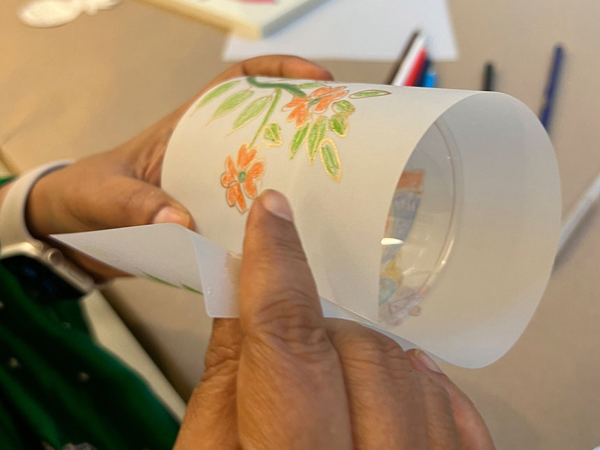 wrapping paper around glass container
