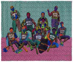 Brightly colored quilt depicting a group of young baseball players in uniform