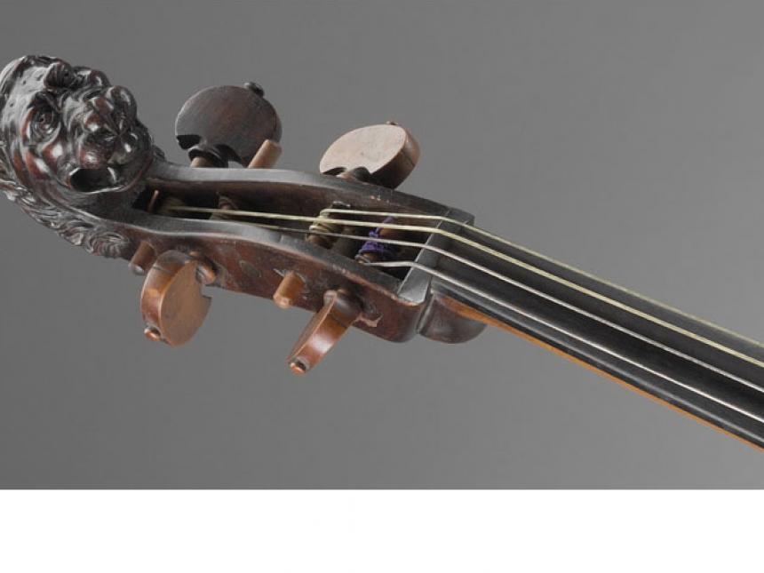 Detail of violin head in shape of lion