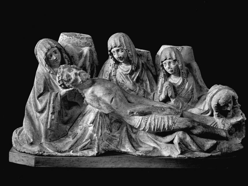 Gothic sculpture of lamentation over body of Christ