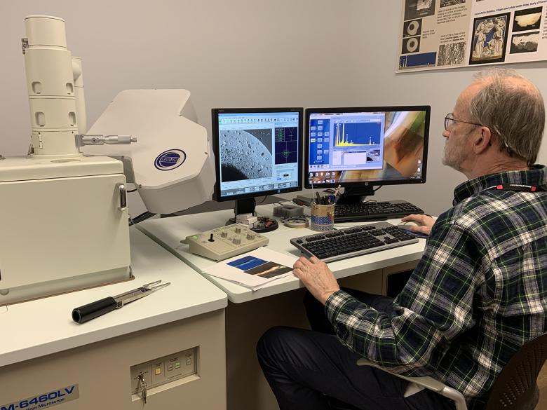 Scanning electron microscope being used to analyze an ancient Egyptian faience bead