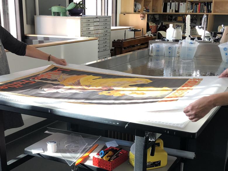 Preparing Chéret poster for water treatment