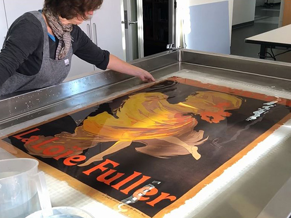 Immersion of Chéret poster in water bath
