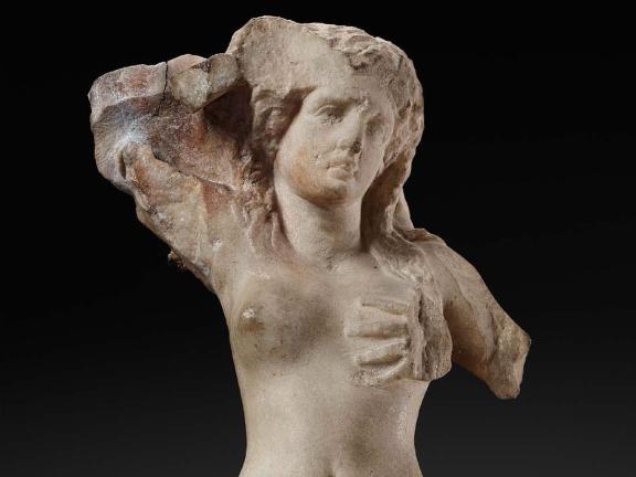 Ancient Greek sculpture of torso of siren