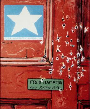 Closeup of a door painted red with a bullet holes.