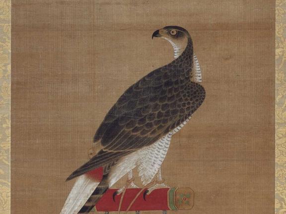 scroll painting of hawk on perch