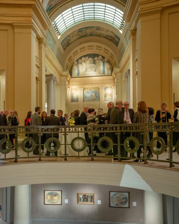 group of people gathered in the rotunda