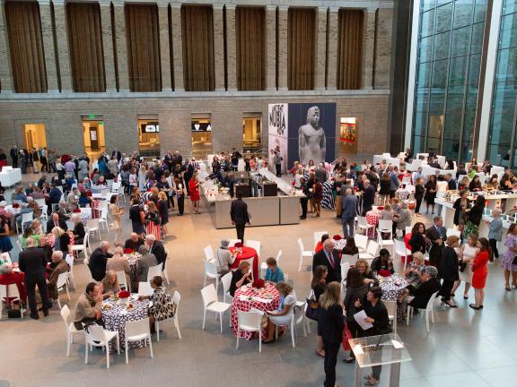 Patrons in the Shapiro Family Courtyard during Women Take the Floor opening