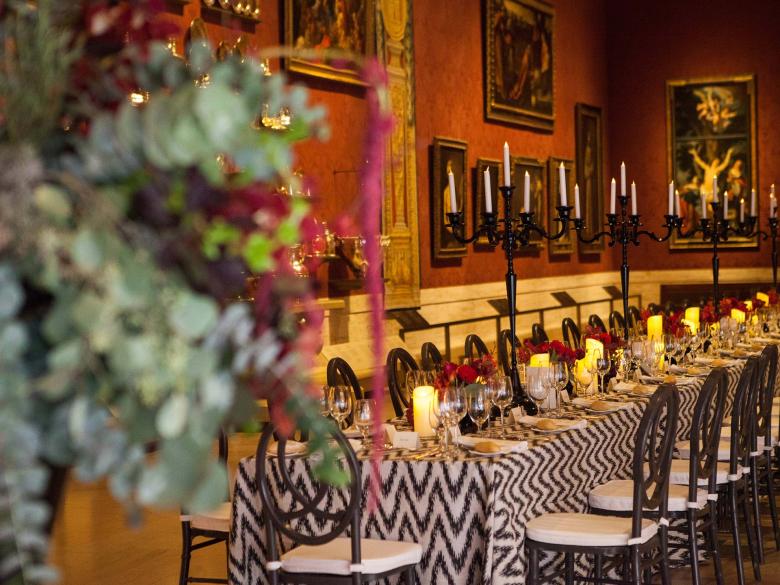 A long, decorated and set table in the Koch gallery