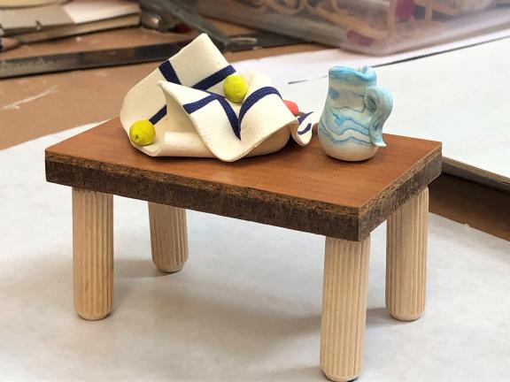 miniature model of a table made by young student