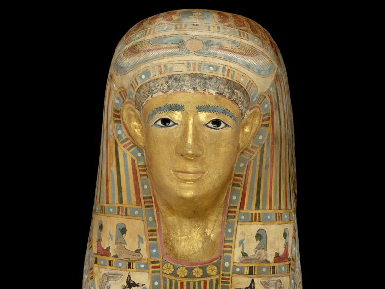 Mummy mask detail, painted and gilded cartonnage, inlaid glass