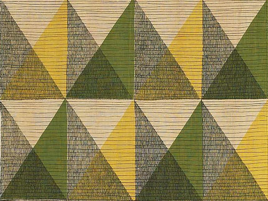 detail of fabric with triangles of various colors arranged neatly in grid