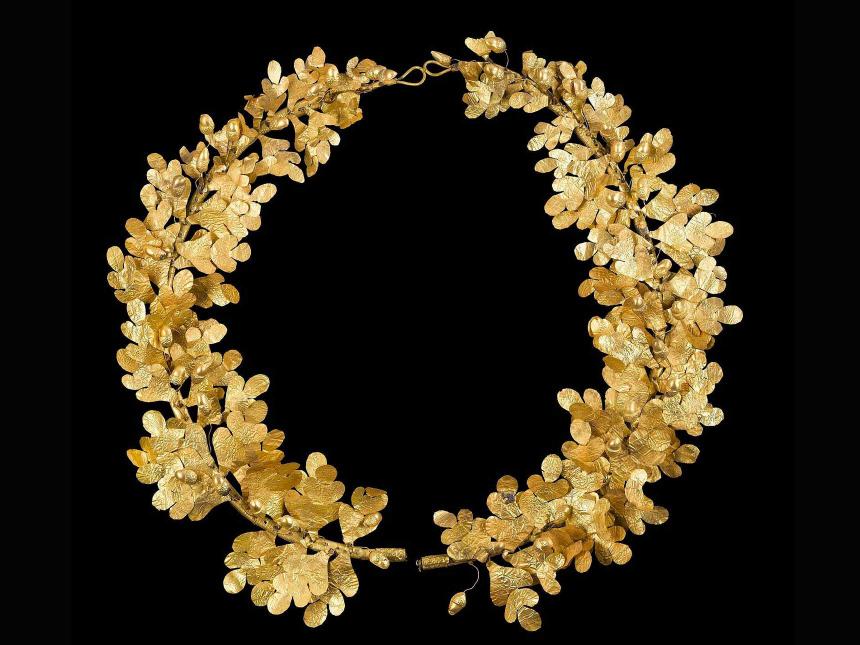 wreath with leaves and acorns made out of gold