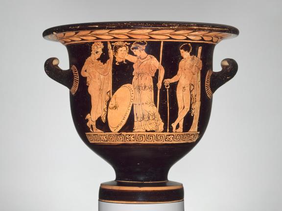A black ceramic bowl depicting Perseus, Athena, and Hermes.