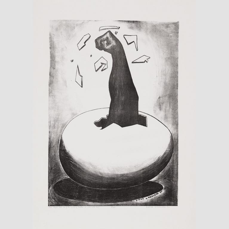 A black arm with a clenched fist breaks through the shell of an egg, spreading shattered eggshell as it pumps upward.