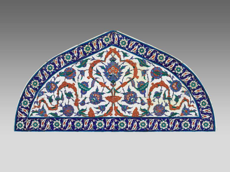 Ottoman tile lunette featuring small tiles in multiple colors