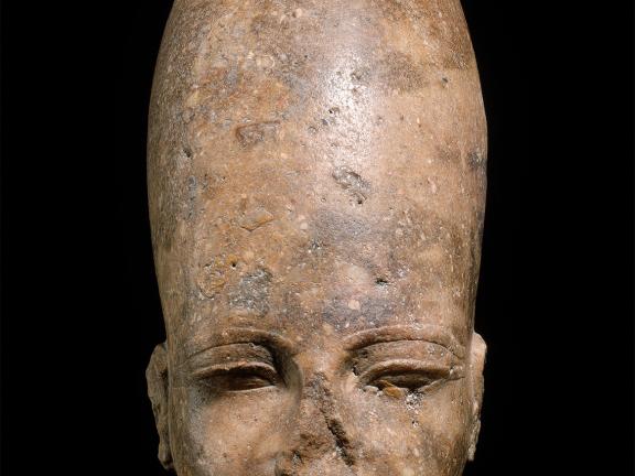 Quartzite bust of man's head.