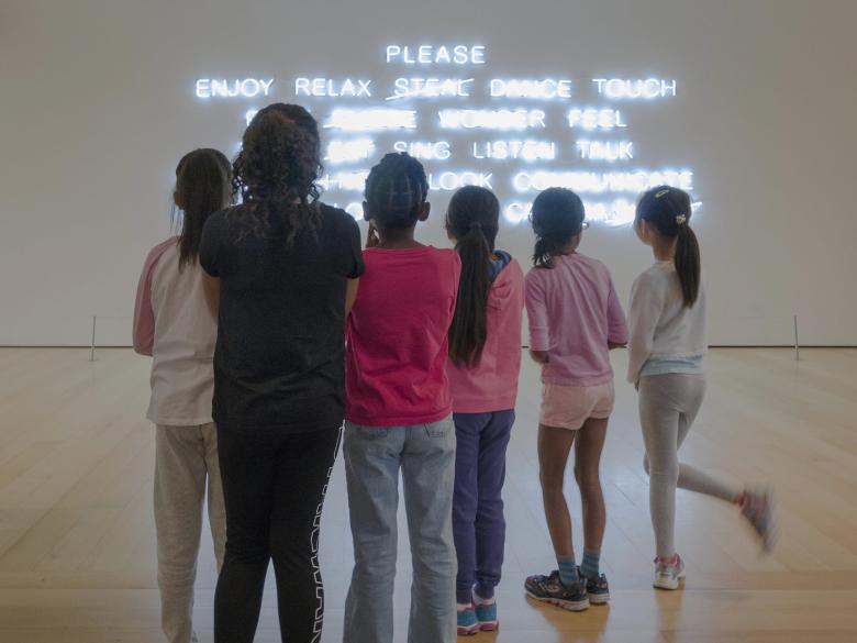 A school group pauses in front of Jeppe Hein's work PLEASE...
