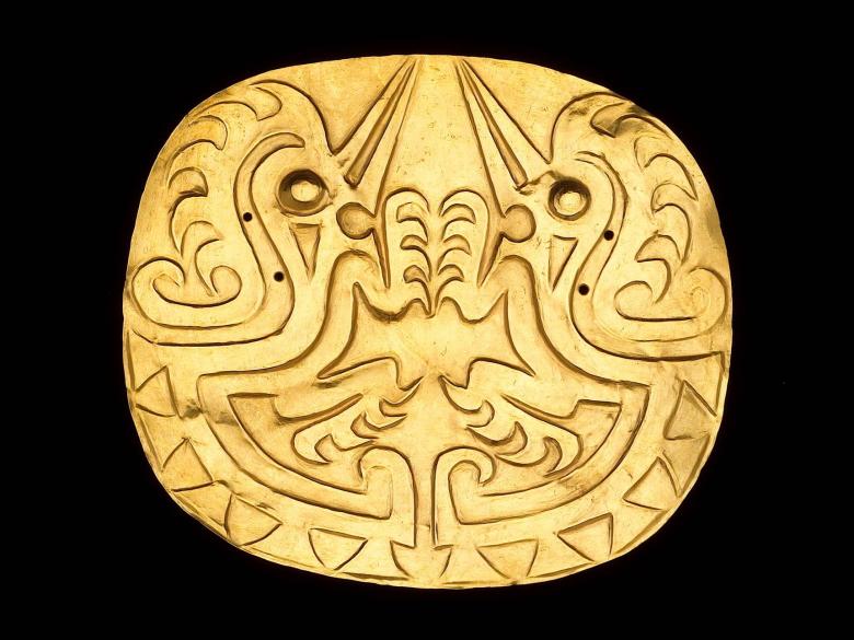 gold embossed disk pectoral depicting two bird-like zoomorphs