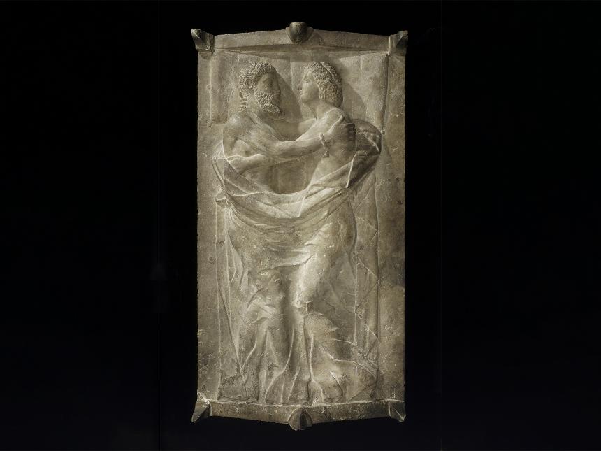 Overhead view of Etruscan sarcophagus depicting couple lying down in embrace