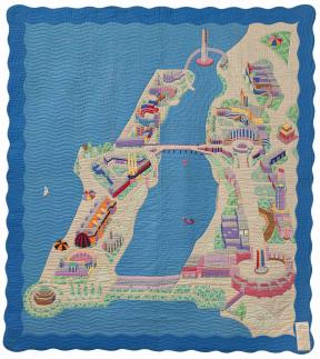 Multi colored quilt depicting a map and assorted objects