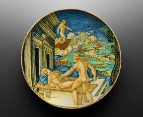A glazed, round dish depicting Medea and Aeson.