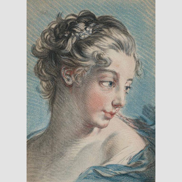 A colorful, engraved piece of metal with the portrait of a young woman whose head is turned toward the right.