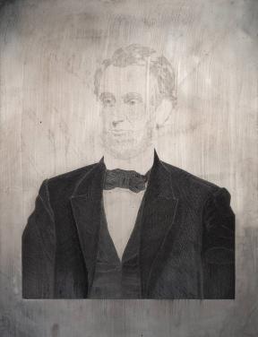 A plate engraved with a portrait of Abraham Lincoln.