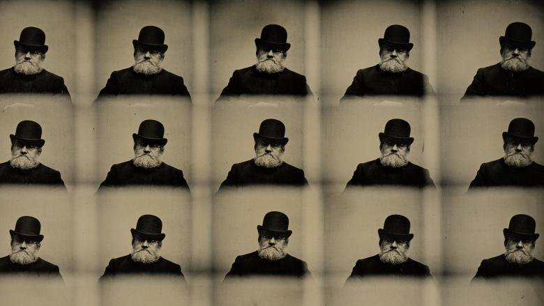 A repeated composite photo of a man in a black coat and black top hat. 