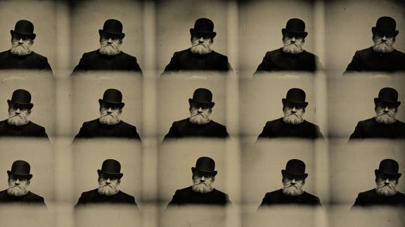 A repeated composite photo of a man in a black coat and black top hat. 