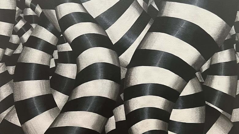 A mass of tangled black-and-white striped tentacle-like structures. 