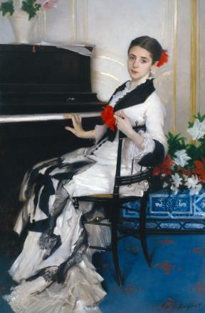 A portrait of Madame Ramón Subercaseaux wearing a white gown and red flower in her hair while seated at a piano.