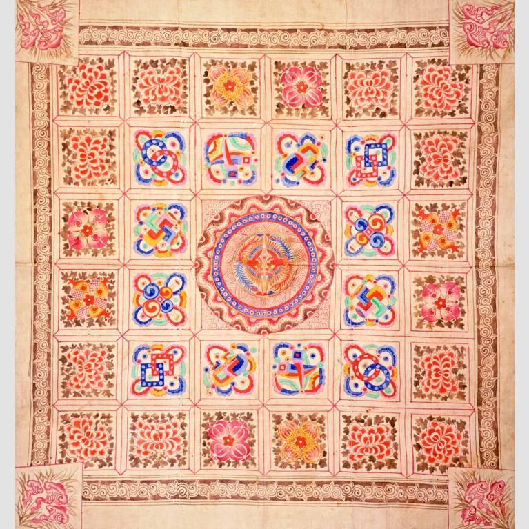 A square hemp wrapping cloth with a multi-colored painted design.
