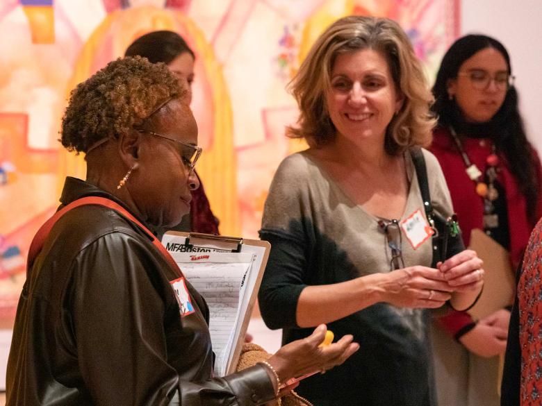 Educators attend a professional development workshop in the Tender Loving Care exhibition