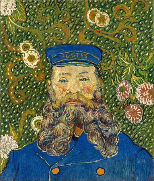 A man with a blue had that reads "Postes" and a long, curly grey beard.