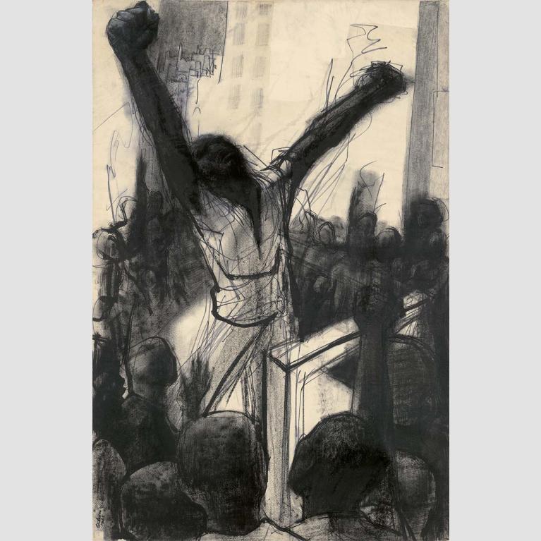 Man with his arms stretched out surrounded by a crowd of people 