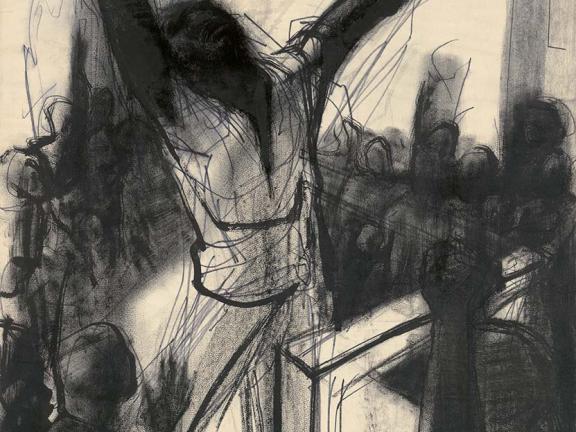 Man with his arms stretched out surrounded by a crowd of people 