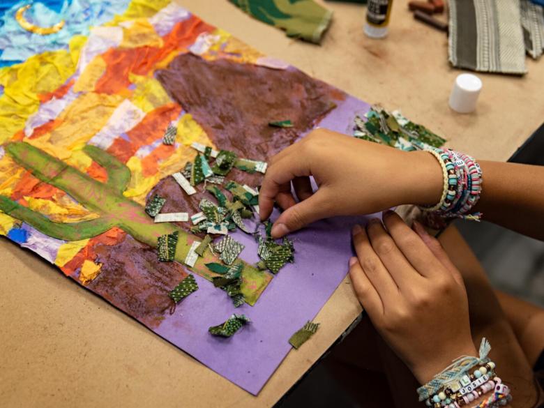 Teen student creates mixed media landscape of desert (SAC)