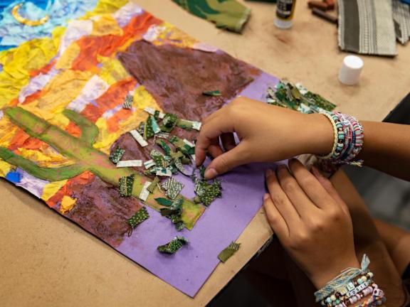 Teen student creates mixed media landscape of desert (SAC)